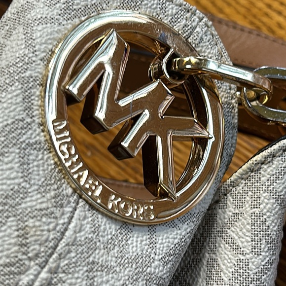 Michael Kors handbag. Vanilla color with tan straps and gold hardware. - Picture 2 of 16